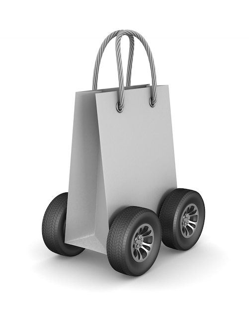 Paper gift bag with wheels on white.