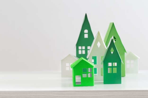 Paper house on white background