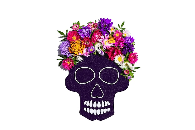 Paper human skull for Mexican Day of the Dead isolated on white Colorful traditional flowers