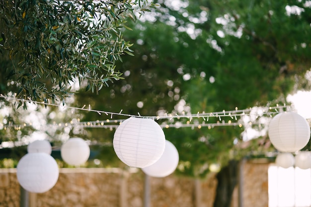 Paper lanterns a garland of paper balls