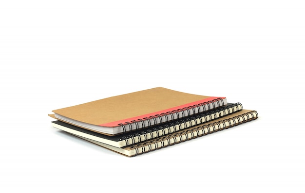 Paper note books ridge with coil on white