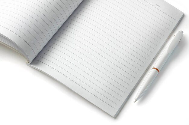 Paper note with a pen  on white background
