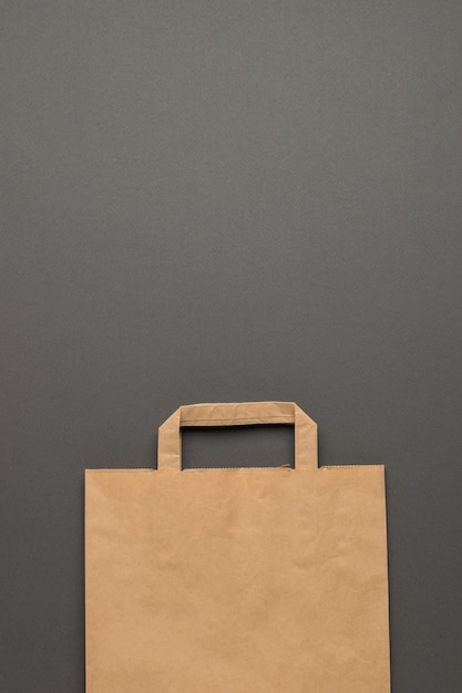 Photo paper packaging bag on a gray background. space for your text. flat lay.