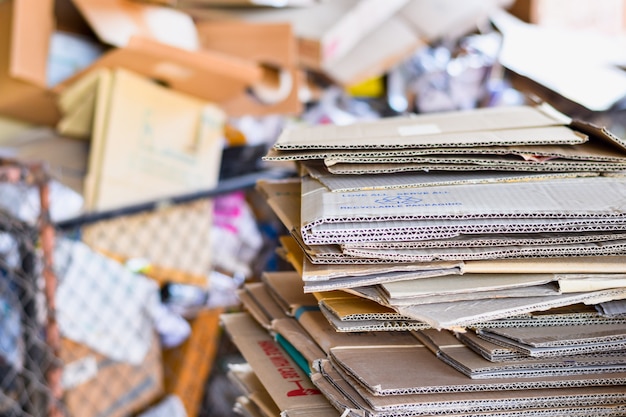 Paper packed and cardboard corrugated paper ready to recycle in sorting garbage