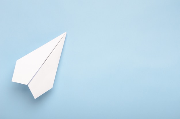 Paper plane on a blue background