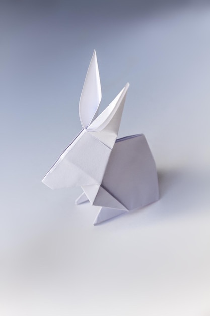 Paper rabbit origami isolated on a white background