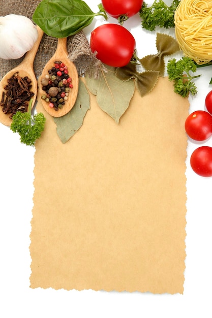 Paper for recipesvegetables and spices isolated on white