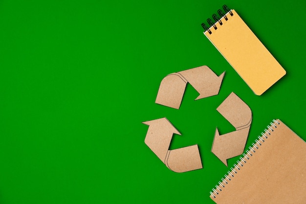 Paper recycling concept on green top view