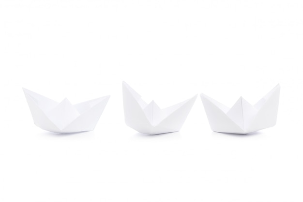 Paper ships isolated on white