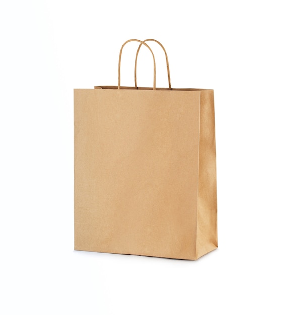 Paper shopping bag isolated on white surface