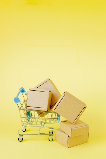 Paper shopping bags in a shopping cart