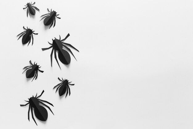 paper spiders on an white background