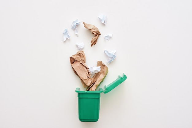 Paper trash crumple paper falling to the recycling bin