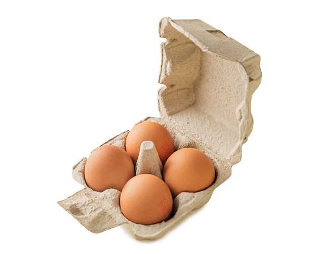 Paper tray box for 4 four eggs on an isolated white background