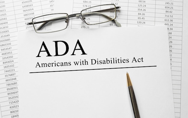 Paper with Americans with Disabilities Act ADA on a table