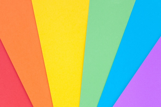 paper with lgbt colors as a background. rainbow colors. pride community.