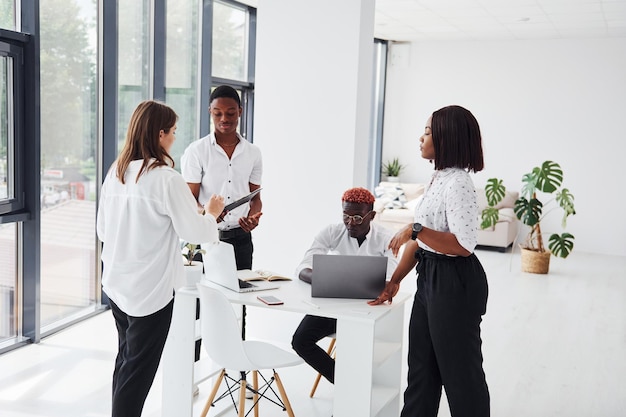 Paper work Group of african american business people have job in office together