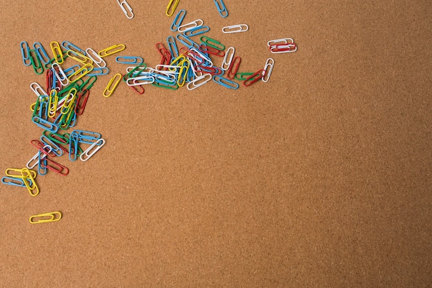 Paperclips on wooden surface