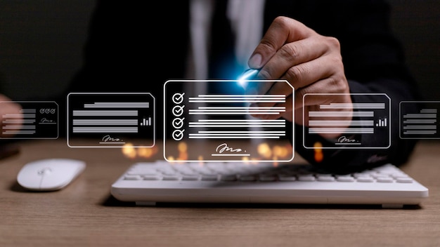 Paperless workplace ideas esigning electronic signature\
document management a businessman signs an electronic document on a\
digital document on a virtual screen using a stylus pen