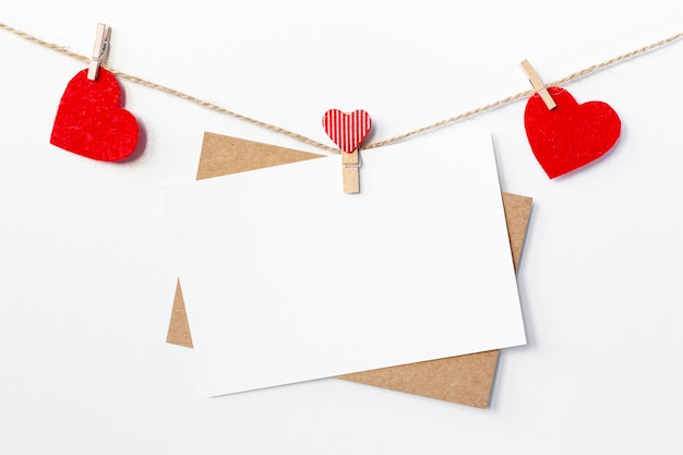 Photo papers with hearts on string for valentines day