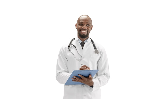 Paperwork. African-american doctor isolated on white background, professional occupation. Daily hard work for health and lives saving. Half-length portrait. Medicine, healthcare, profession concept.