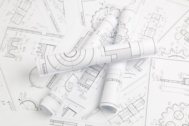 Papiertechnische tekeningen van industriële onderdelen en mechanismen