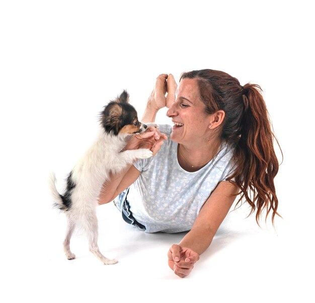 papillon dog and woman