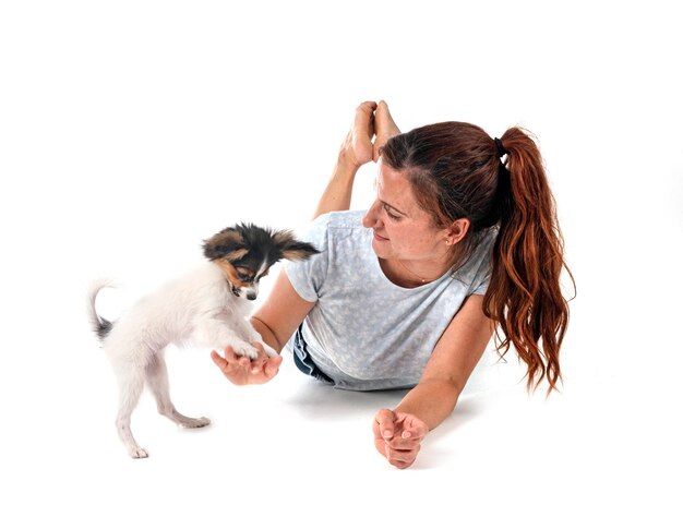 papillon dog and woman