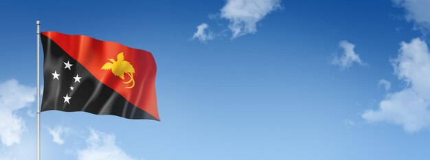 Papua New Guinea flag isolated on a blue sky Horizontal banner