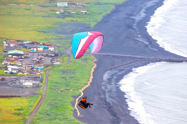 Paraglider flying in Iceland Nature and places for wonderful travels