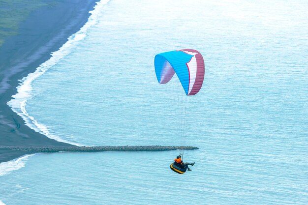 Paraglider flying in Iceland Nature and places for wonderful travels