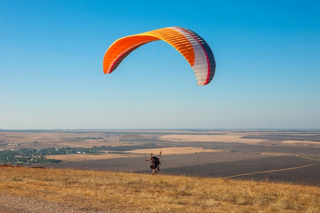 paraglider flying in the sky on a Sunny day active in Koktebel