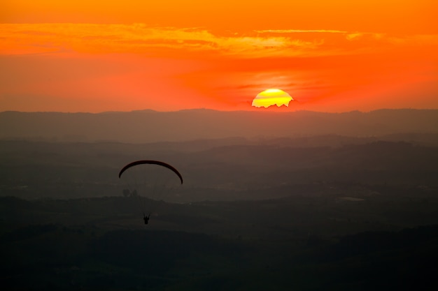 Paragliding in sunset