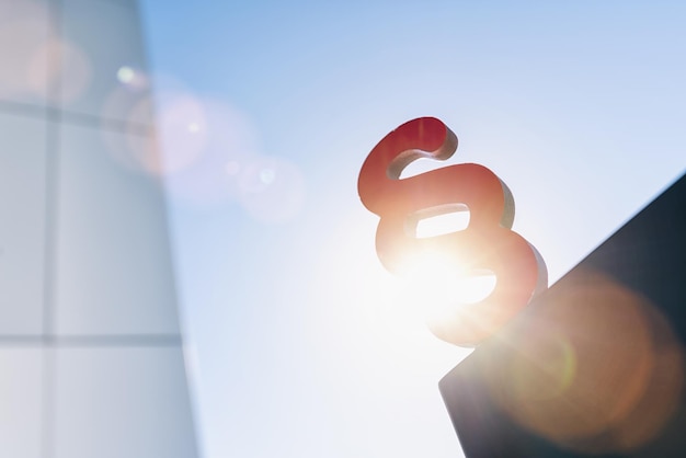 paragraph symbol in the sun at business district