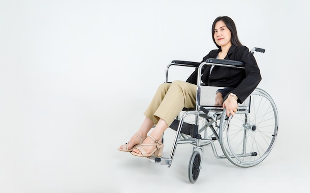 Paralysis asian woman suffers from accident injury, difficult\
to move forward by wheelchair transportation. disabled patient care\
for medication and physical rehab at hospital to recover\
lifestyle.