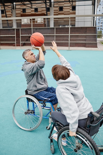 Paraplegic couple playing together