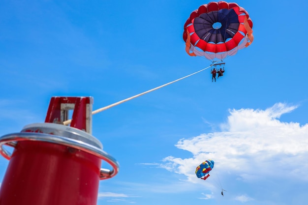 Parasailing above the ocean at tropical island