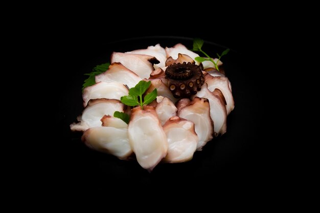 Parboiled and sliced octopus