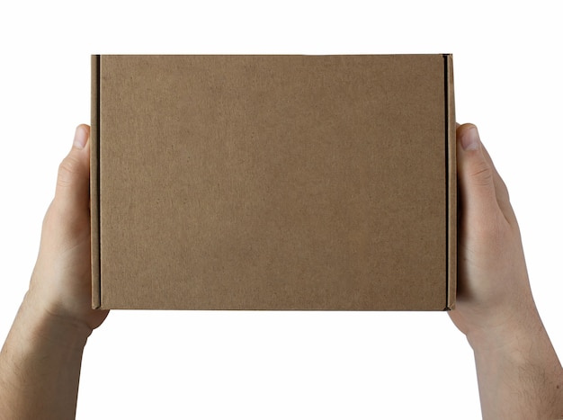 Photo a parcel cardboard box in a men hands on a  delivery service concept