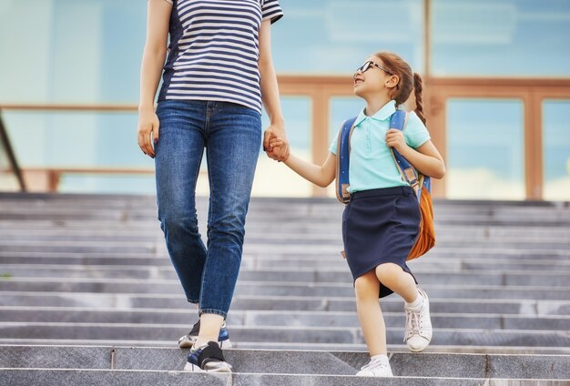 Parent and pupil go to school