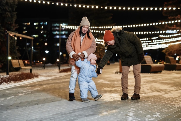 Parents And Child In Evening