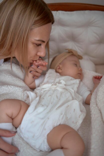 parents comfort their child in a cradle