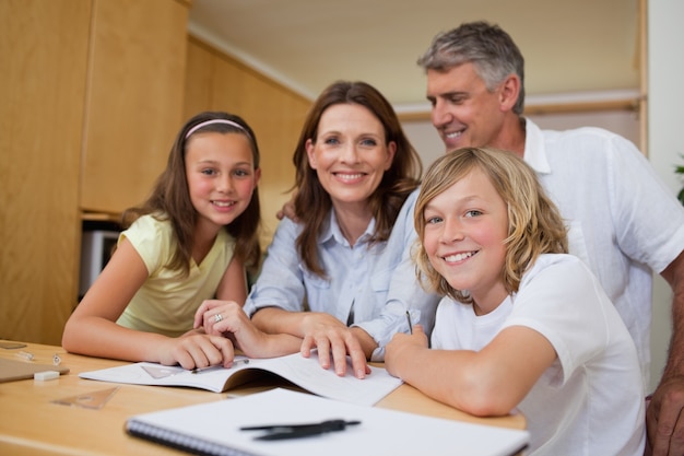 Parents helping children with homework