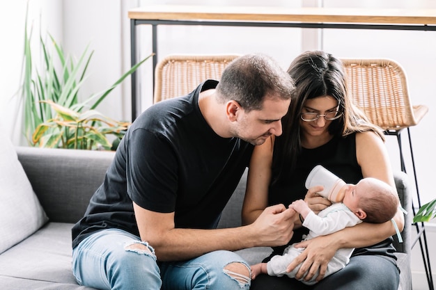 Parents holding newborn baby