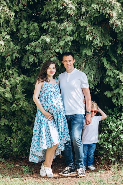 Parents and their little son in the park