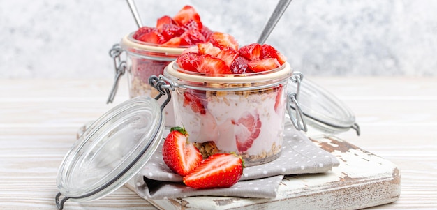 Parfait with fresh strawberries yoghurt and crunchy granola