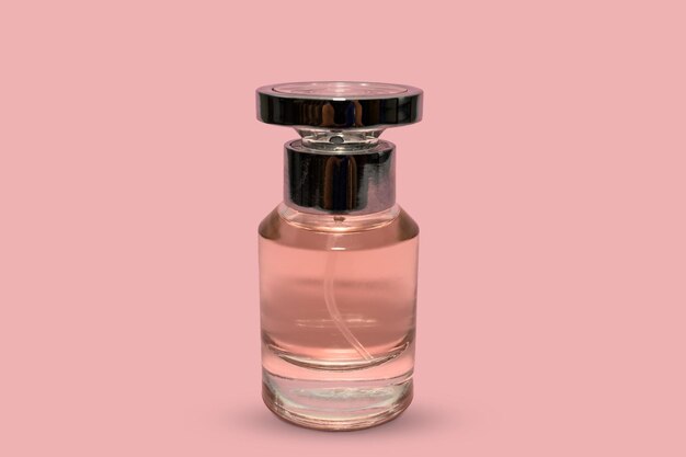 Parfumflesje voor dames. Op een roze achtergrond. Cosmetica voor vrouwen.