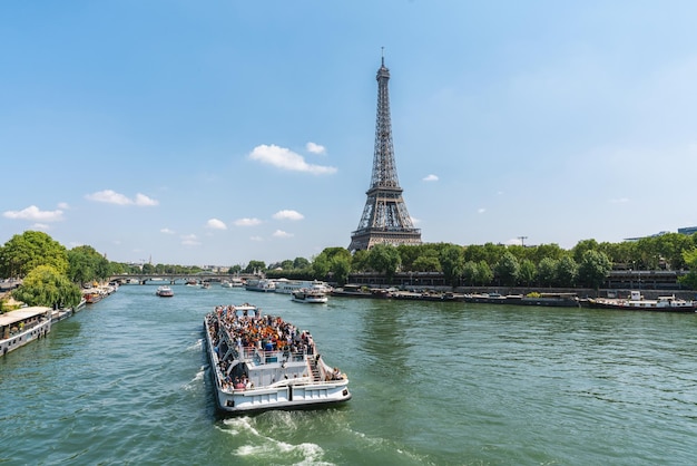 Paris Eiffel Tower and river Seine in Paris France Eiffel Tower is one of the most iconic landmarks of Paris