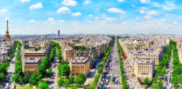 PARIS FRANCE JULY 06 2016 Beautiful panoramic view of Paris from the roof of the Triumphal Arch Champs Elysees and the Eiffel Tower