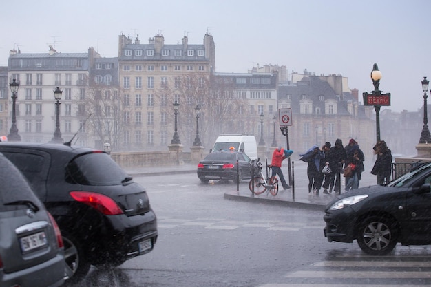 PARIS, FRANCE - MARCH 28, 2018: bad weather - heavy rain on the streets of Paris. Paris, France